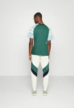 Kaotiko PANTALON CHANDAL RETRO ATHLETIC UNISEX - Tracksuit Bottoms - Marfil/heura/navy 2 Kaotiko PANTALON CHANDAL RETRO ATHLETIC UNISEX - Tracksuit Bottoms - Marfil/heura/navy -Kaotiko Shop 0362fead42ee497387091ecefd5c81c8