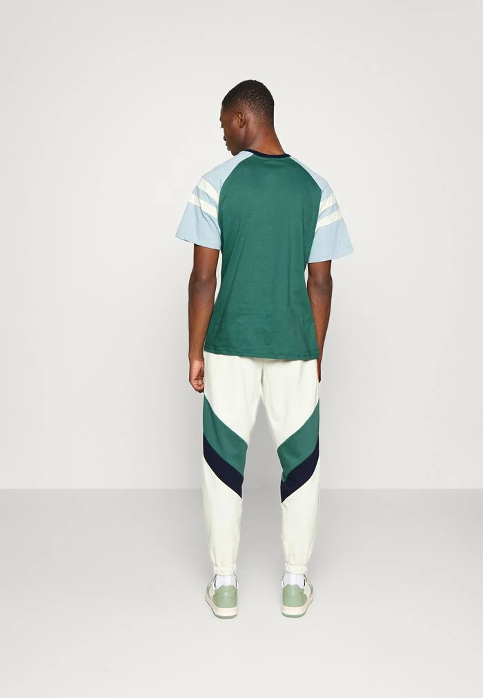 PANTALON CHANDAL RETRO ATHLETIC UNISEX - Tracksuit bottoms - marfil/heura/navy Kaotiko PANTALON CHANDAL RETRO ATHLETIC UNISEX - Tracksuit Bottoms - Marfil/heura/navy -Kaotiko Shop 0362fead42ee497387091ecefd5c81c8