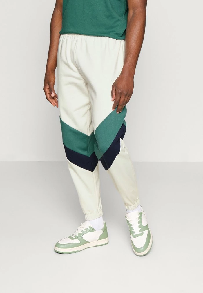 PANTALON CHANDAL RETRO ATHLETIC UNISEX - Tracksuit bottoms - marfil/heura/navy Kaotiko PANTALON CHANDAL RETRO ATHLETIC UNISEX - Tracksuit Bottoms - Marfil/heura/navy -Kaotiko Shop 61276171e550460cad7a80e088714954