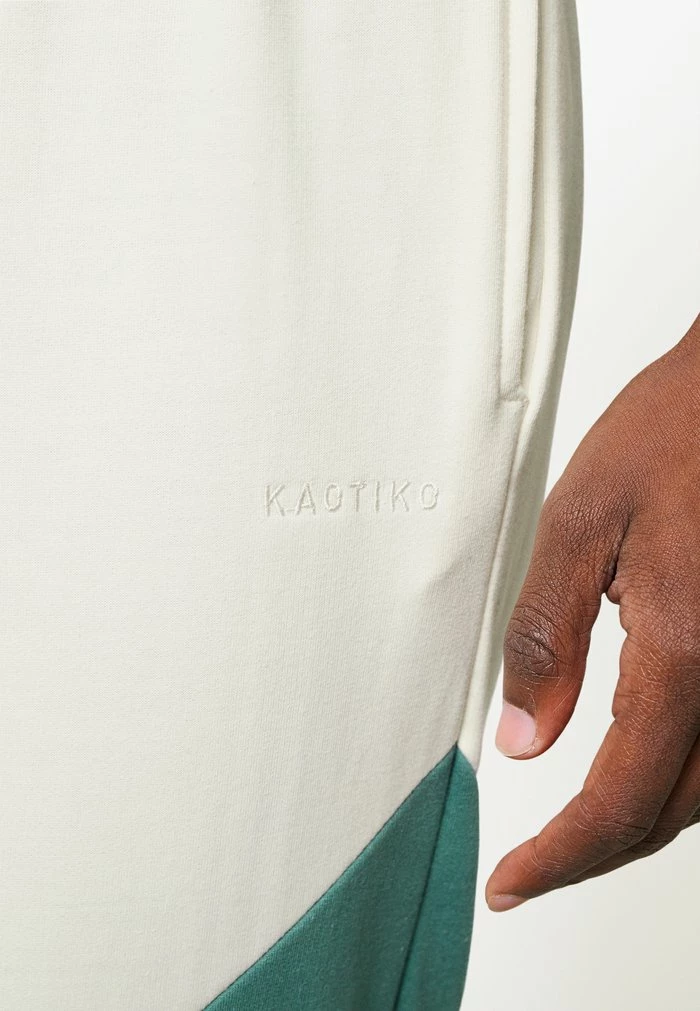 PANTALON CHANDAL RETRO ATHLETIC UNISEX - Tracksuit bottoms - marfil/heura/navy Kaotiko PANTALON CHANDAL RETRO ATHLETIC UNISEX - Tracksuit Bottoms - Marfil/heura/navy -Kaotiko Shop d98b553f757a43459da27d1638483eaf